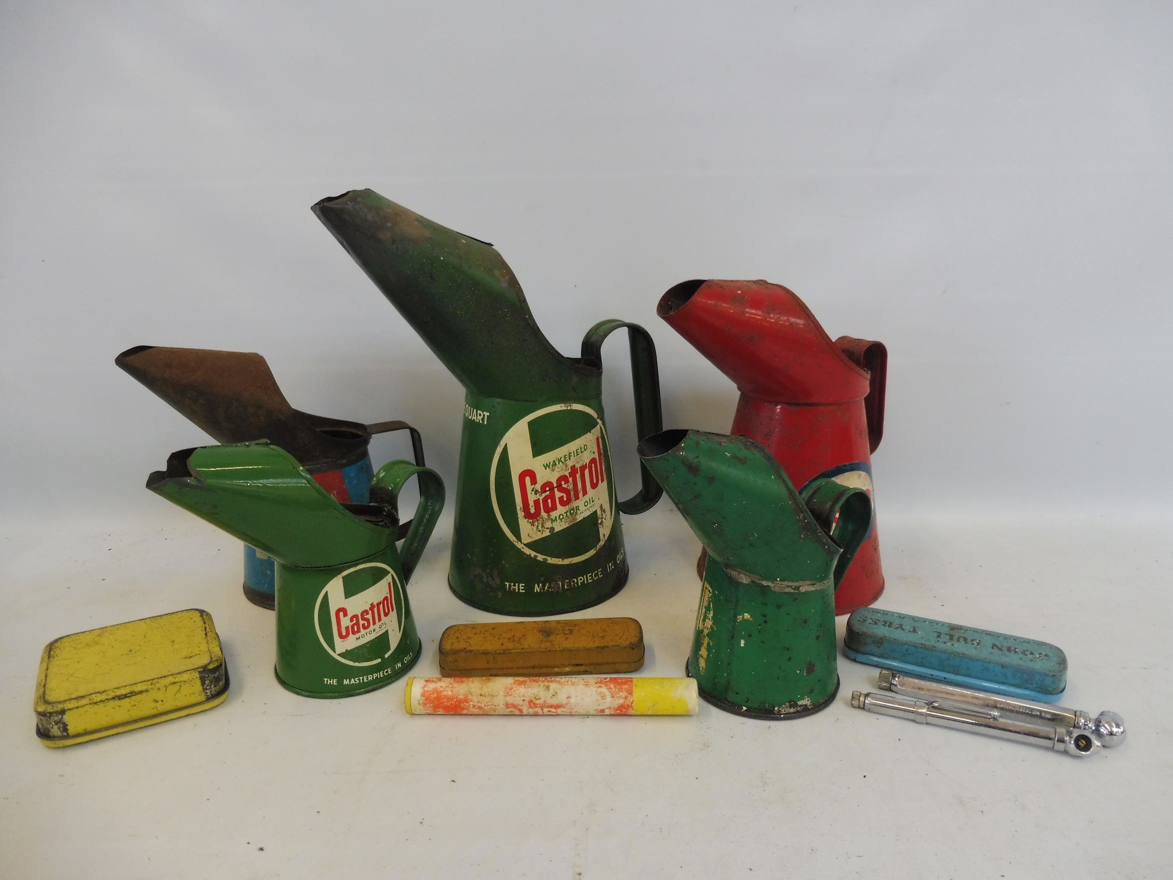 A box of oil measures including a Castrol quart and a half pint, plus puncture repair kits etc. - Image 2 of 3