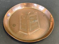 A copper ashtray advertising Pratt's Perfection Spirit, stamped J.S&S.