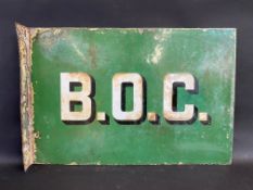 A B.O.C. (British Oil Company) double sided enamel sign with hanging flange by Falkirk Iron, patches