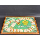 A framed and glazed Pratts High Test Brooklands Race Game board, 26 x 16 1/2", sold with counters in