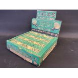 A counter top dispensing box for Lucas 'Blue Star' bulbs.