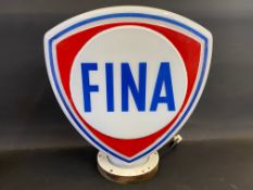 A Fina glass petrol pump globe, one side has the red overpainted, the neck encased in a purpose-made