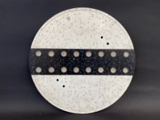 A circular de-restriction road sign with a complete set of glass reflective discs, 18" diameter.