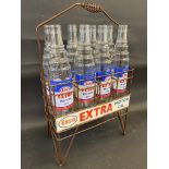 An Esso Extra Motor Oil eight division garage forecourt crate with eight correct glass bottles