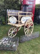 A Victorian dairy delivery pram built by Express Dairies, sign written for A.H.Bolton