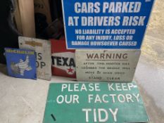 A selection of assorted garage signage.