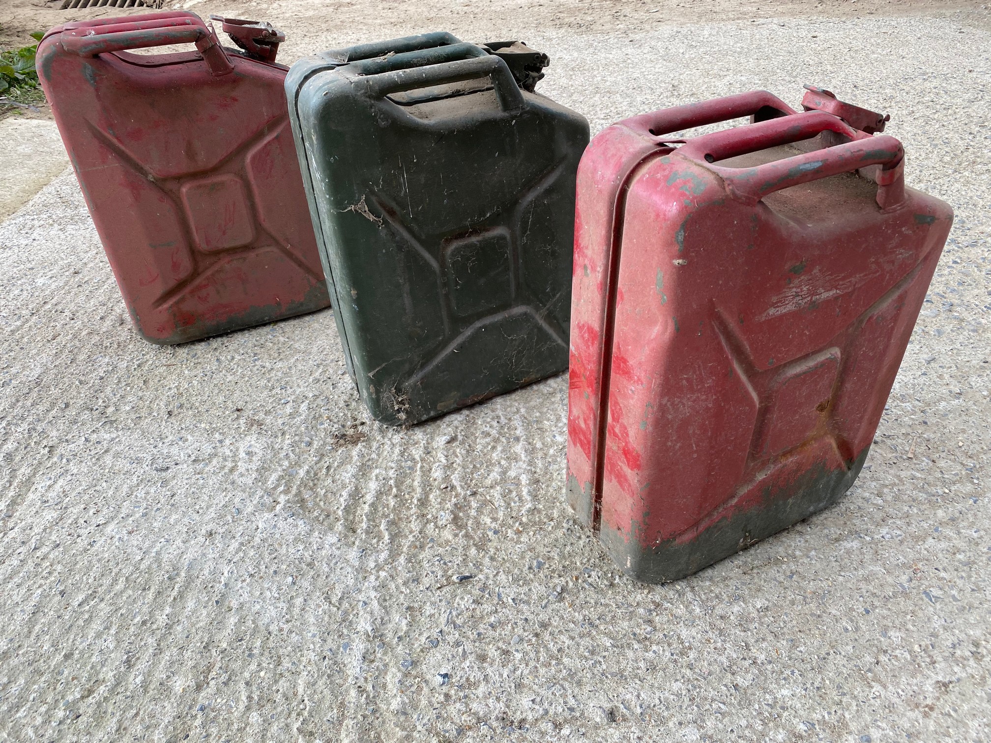 Three jerry cans.