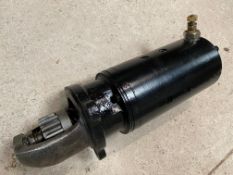 An Amilcar starter motor, reconditioned, still with invoice for £350 + VAT attached.