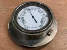 A good quality dash mounted barometer with white enamel dial.