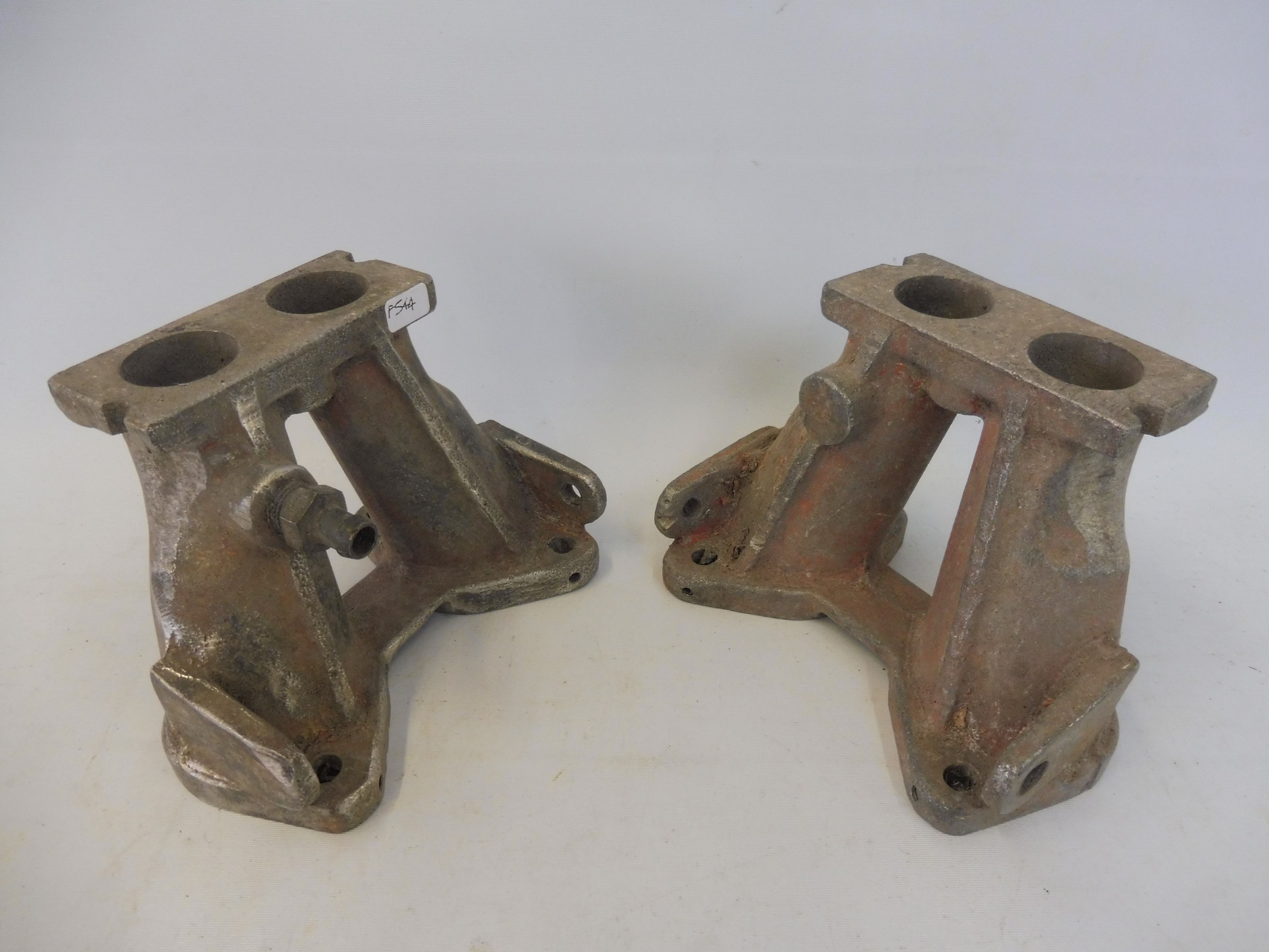 A pair of Lotus Cortina Mk.I aluminium inlet manifolds for twin 40s & 45s.