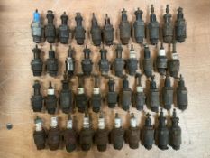 A collection of early spark plugs.