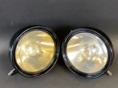A pair of Rotax headlamps, 8" diameter overall, appear very well restored and still in excellent