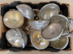 A box of assorted spot lamps etc.