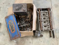 An autojumbler's lot of various parts to include a twin cam four cylinder head, various