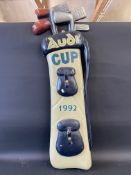 A decorative wall mounted 3D bag of golf clubs advertising Audi Cup 1992, 48" high.