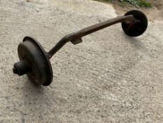 A front axle with hubs still attached, possibly vintage Morris Minor, plus a wire wheel.