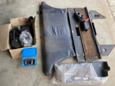 A selection of MGB parts including a two piece rear seat, filters, steering column shroud etc.