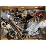 A box of chrome fittings including exterior mirrors, interior fitments including bakelite