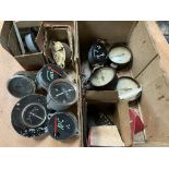 A quantity of new old stock temperature, oil and fuel gauges.