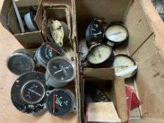 A quantity of new old stock temperature, oil and fuel gauges.