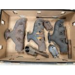 A box of Riley exhaust manifolds etc.