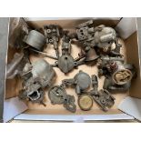 A box of Solex carburettor parts.