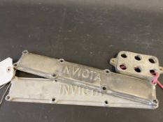 Two Invicta 4 1/2 litre cam follower covers, one reproduction, one original.