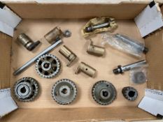 A box of inlet and exhaust timing gears and oil pump eccentrics including a set that have been