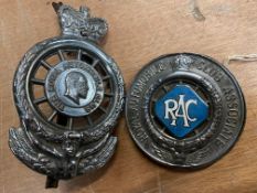 Two RAC car badges.
