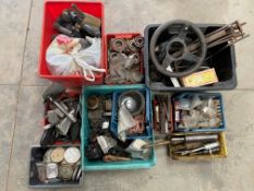 An autojumbler's lot of various parts including grease guns, bearings, tax disc holders, wing