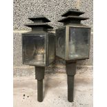 A near pair of carriage lamps with bevelled glass lenses.