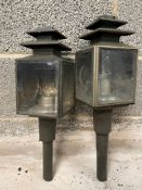 A near pair of carriage lamps with bevelled glass lenses.