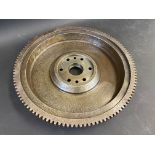 A Meadows 4 1/2 litre flywheel with ring gear, unused.