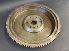 A Meadows 4 1/2 litre flywheel with ring gear, unused.