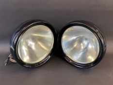 A superb pair of Lucas No.L76 bell-shaped headlamps, approx. 10" diameter, either new old stock or