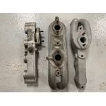 Three Riley single carburettor inlet manifolds, two appear to be for SU carbs, the third possibly