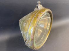 A large CAV circa early 1920s brass headlamp.