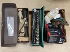 A box of tools including a boxed regulator, an air cutter, a socket set etc.