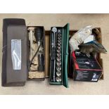 A box of tools including a boxed regulator, an air cutter, a socket set etc.