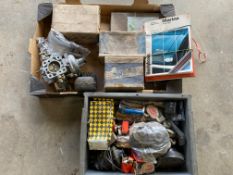 Two boxes of assorted parts to include a Land Rover carburettor, a boxed Lucas wiper motor, a