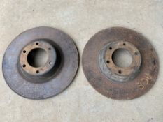 A pair of brake discs, believed 1950s AC Ace.