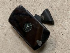 A Smiths interior rear view mirror with clock insert and fittings.