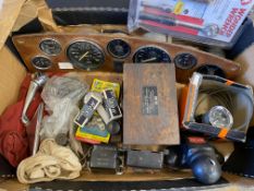 A box of assorted parts including a dashboard for a Triumph Dolomite, two wing mirrors, an