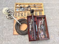 A quantity of general workshop tools plus a bench lamp.