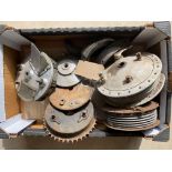 A box of hubs and Norton brake plates including a Norton front racing brake plate.