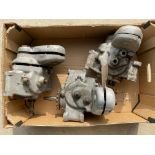Three incomplete Norton gearboxes.