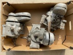 Three incomplete Norton gearboxes.