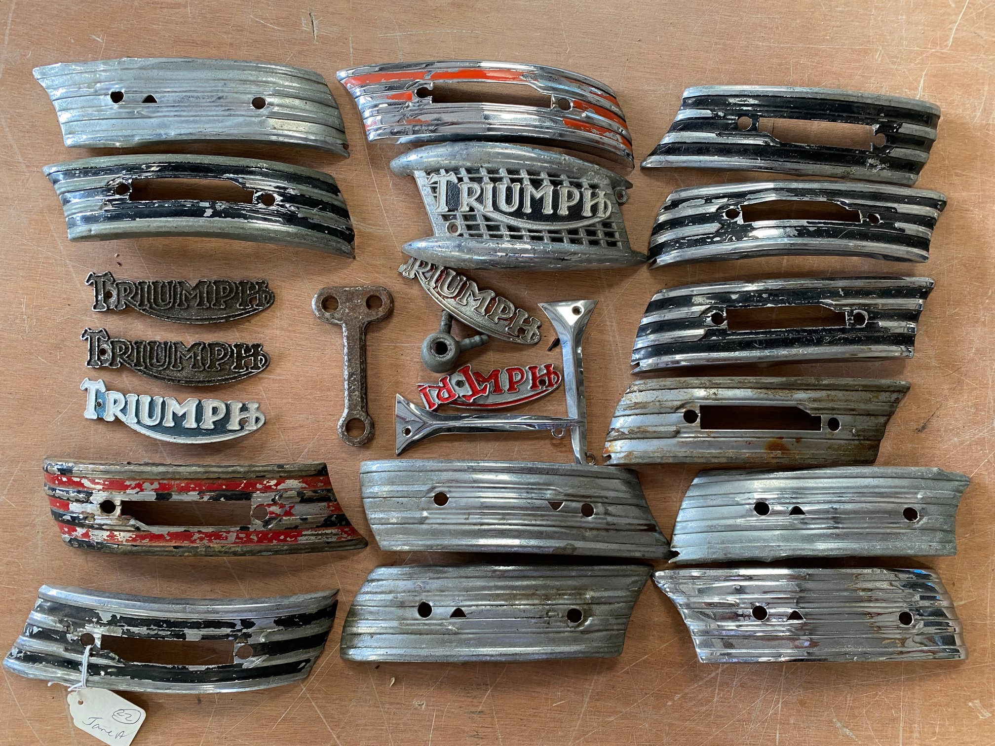 A quantity of fuel tank badges.