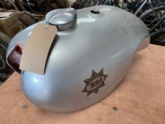 A BSA Gold Star fibreglass racing fuel tank.