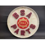 A decorative wooden sign advertising BSA Parts, 24" diameter.
